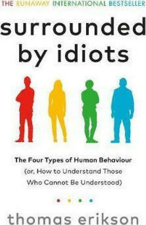 SURROUNDED BY IDIOTS Paperback